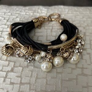 Gold and Black Charm Bracelet